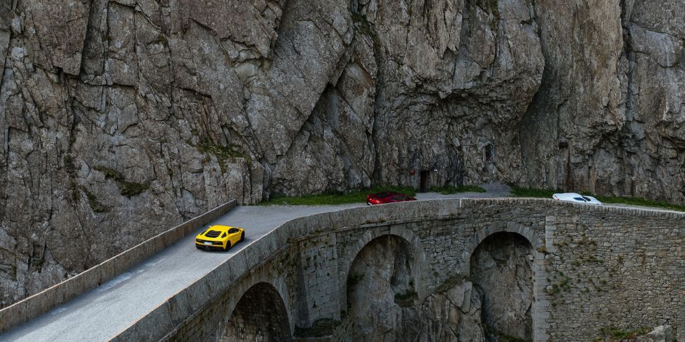 Rock, Wall, Yellow, Vehicle, Geological phenomenon, Formation, Tree, Architecture, Car, Plant, 
