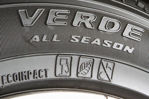 Text, Synthetic rubber, Automotive tire, Font, Grey, Tread, Close-up, Carbon, Circle, Bicycle tire, 