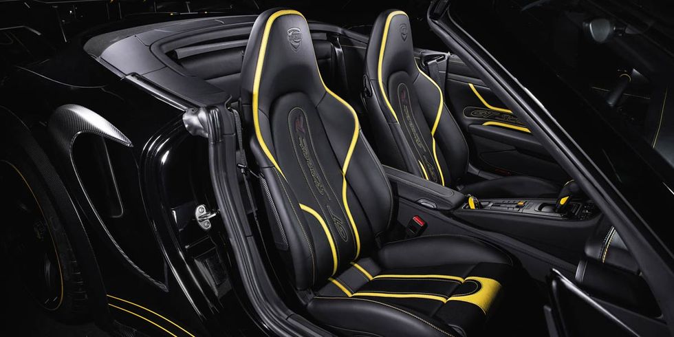 Motor vehicle, Automotive design, Mode of transport, Yellow, Vehicle door, Car seat, Luxury vehicle, Fixture, Car seat cover, Personal luxury car, 