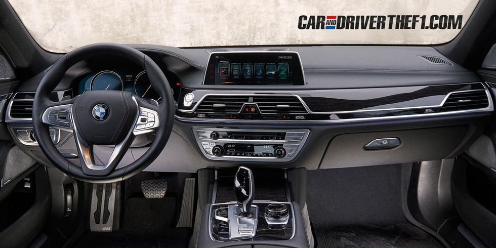 Motor vehicle, Automotive design, Steering part, Steering wheel, Vehicle audio, Center console, Technology, Personal luxury car, Car, Electronic device, 