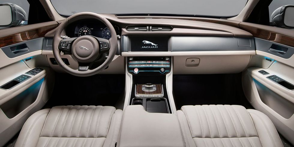Land vehicle, Vehicle, Car, Center console, Steering wheel, Gear shift, Luxury vehicle, Automotive design, Personal luxury car, 