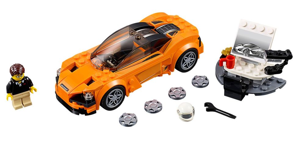 Vehicle, Motor vehicle, Car, Radio-controlled car, Toy, Radio-controlled toy, Model car, Orange, Toy vehicle, Sports car, 