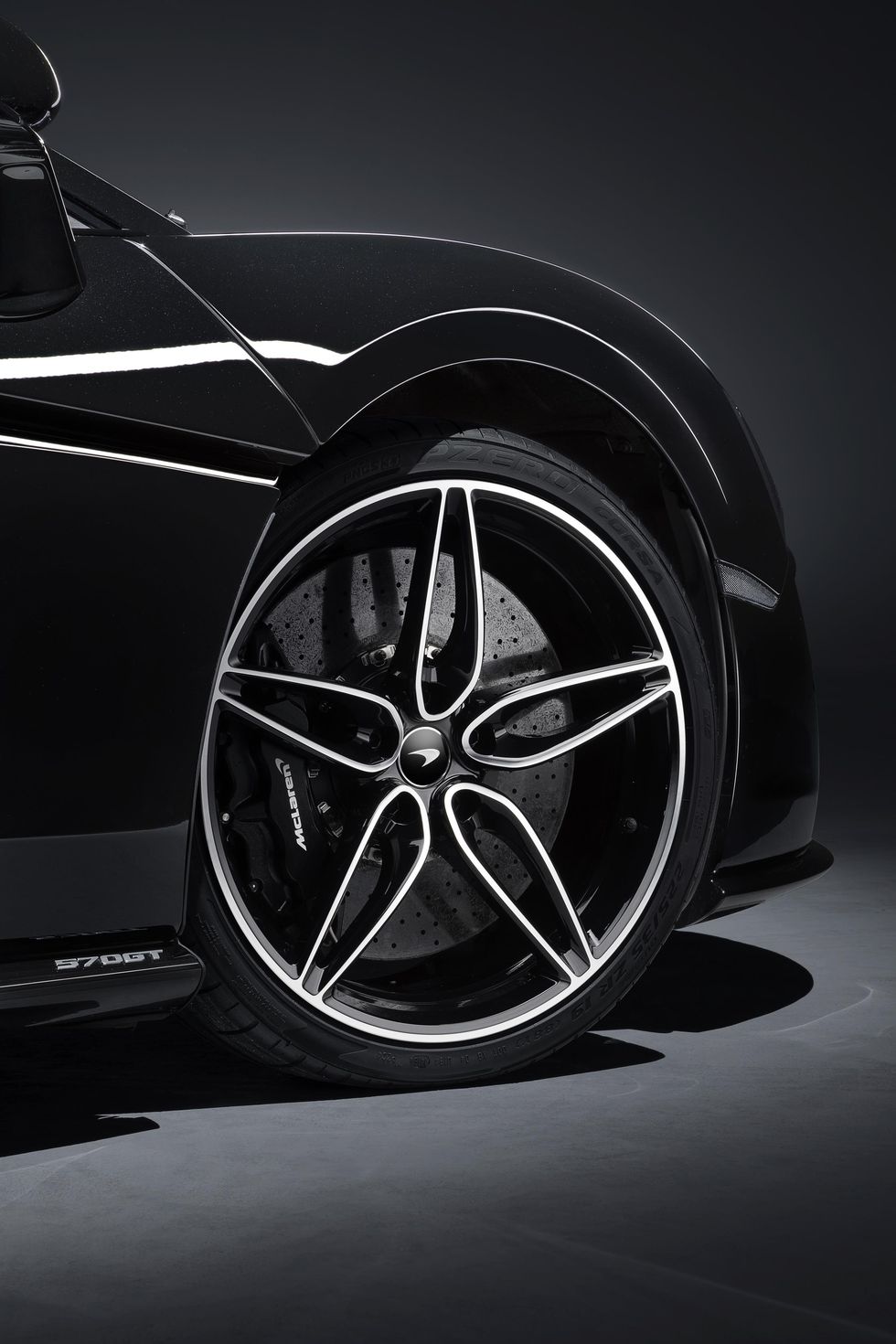 Alloy wheel, Wheel, Black, Automotive design, Rim, Vehicle, Spoke, Car, Automotive wheel system, Tire, 