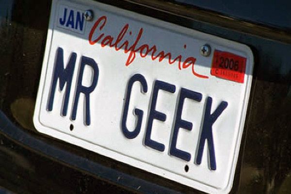 Automotive exterior, Vehicle registration plate, Text, Font, Gas, Number, Paint, Symbol, Bumper part, 