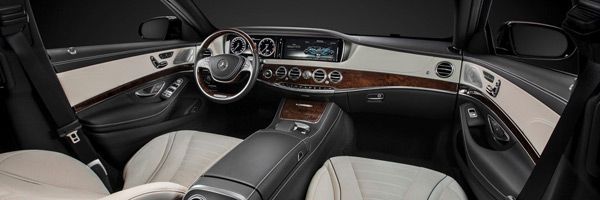 Motor vehicle, Mode of transport, Steering part, Steering wheel, Center console, White, Vehicle audio, Car, Personal luxury car, Luxury vehicle, 