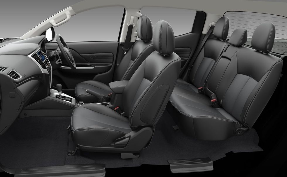Vehicle, Car, Car seat cover, Mode of transport, Mazda, Car seat, Mid-size car, Minivan, Head restraint, Center console, 