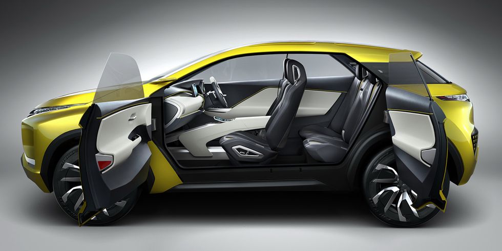 Automotive design, Vehicle, Yellow, Vehicle door, Automotive exterior, Concept car, Rim, Alloy wheel, Automotive wheel system, Sports car, 