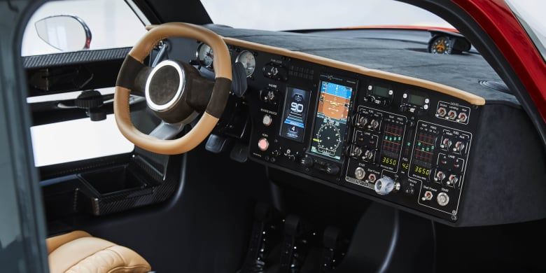 Vehicle, Steering wheel, Car, Steering part, Luxury vehicle, Technology, Center console, Cockpit, 