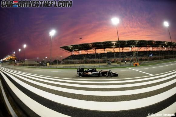 Sport venue, Automotive tire, Infrastructure, Race track, Formula one, Street light, Asphalt, Road surface, Open-wheel car, Formula racing, 