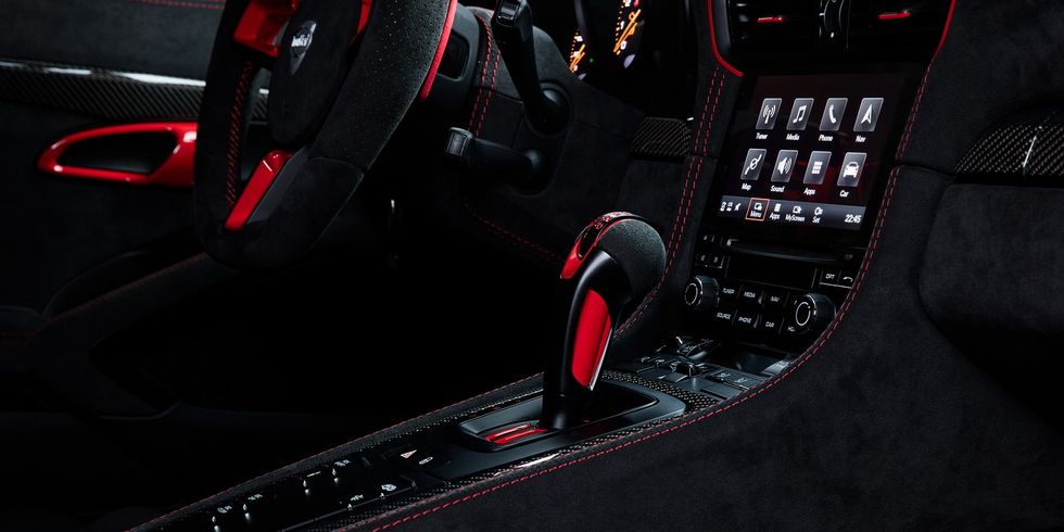 Vehicle, Center console, Car, Luxury vehicle, Steering wheel, Porsche, Supercar, Steering part, 