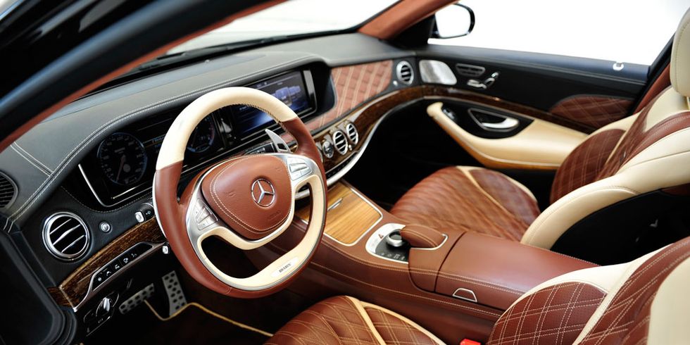 Steering part, Mode of transport, Brown, Steering wheel, Car, Tan, Luxury vehicle, Center console, Speedometer, Personal luxury car, 