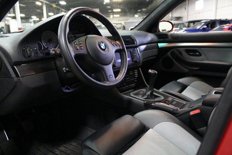 Land vehicle, Vehicle, Car, Steering wheel, Personal luxury car, Center console, Luxury vehicle, Gear shift, Bmw, Steering part, 