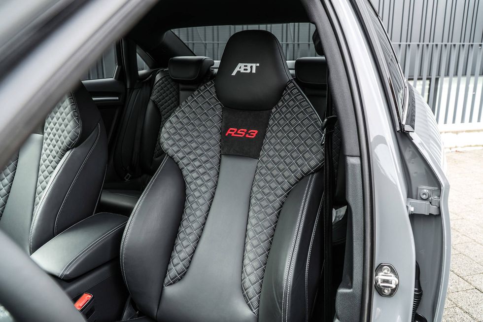 Vehicle, Car, Car seat cover, Car seat, Luxury vehicle, Family car, Mid-size car, Steering wheel, Carbon, 