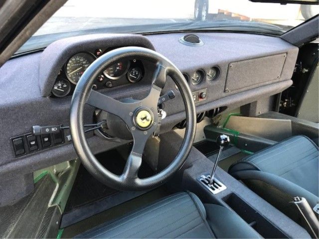 Land vehicle, Vehicle, Car, Steering wheel, Steering part, Ferrari mondial, Center console, Ferrari 328, Supercar, Coupé, 