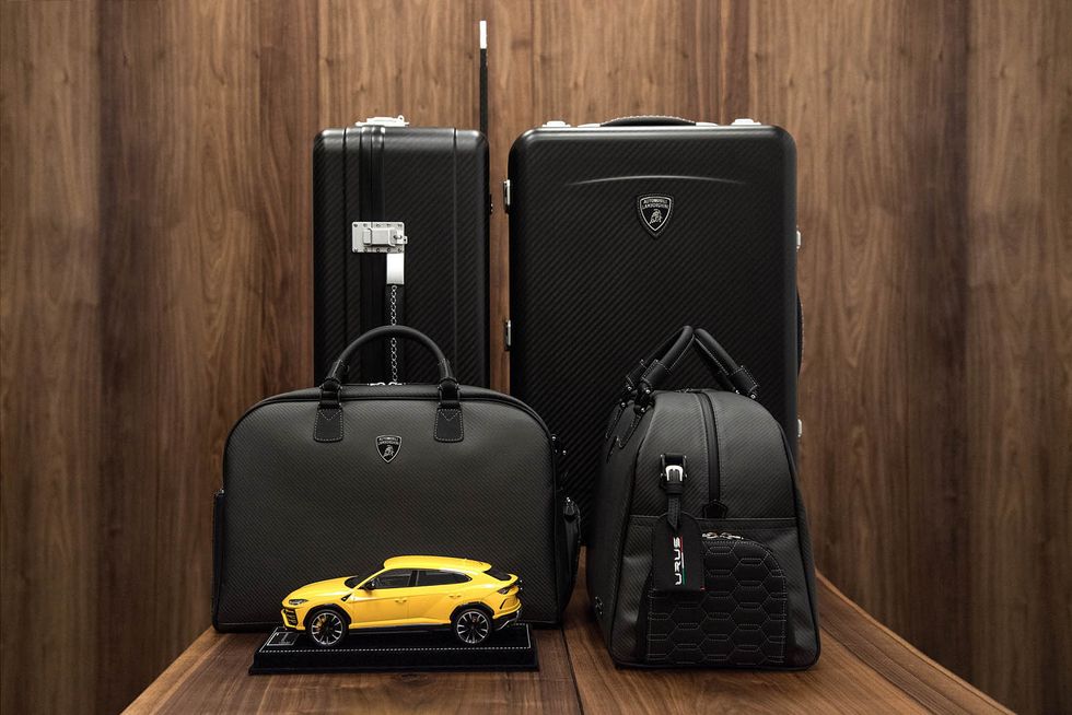 Yellow, Automotive design, Vehicle, Car, Hand luggage, Luxury vehicle, Baggage, Luggage and bags, Bag, Suitcase, 
