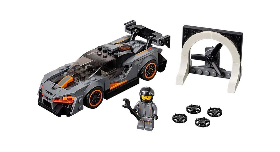 Toy, Lego, Vehicle, Batman, Automotive design, Wheel, Fictional character, Car, Rim, Model car, 