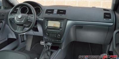 Motor vehicle, Mode of transport, Steering part, Product, Transport, Steering wheel, Vehicle audio, Photograph, Center console, White, 
