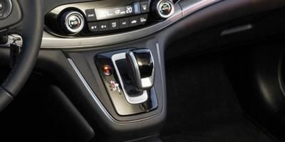Motor vehicle, Mode of transport, Automotive design, Car, Personal luxury car, Luxury vehicle, Steering part, Center console, Steering wheel, Gear shift, 