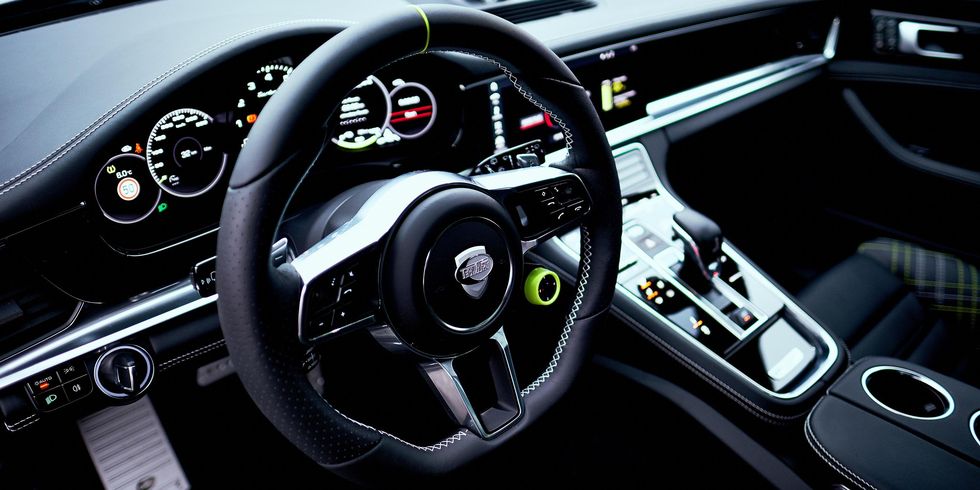 Land vehicle, Vehicle, Car, Steering wheel, Steering part, Gear shift, Center console, Automotive design, Luxury vehicle, Supercar, 