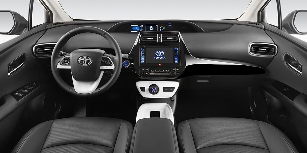 Motor vehicle, Automotive design, Mode of transport, Product, Steering part, Steering wheel, Center console, White, Car, Vehicle audio, 