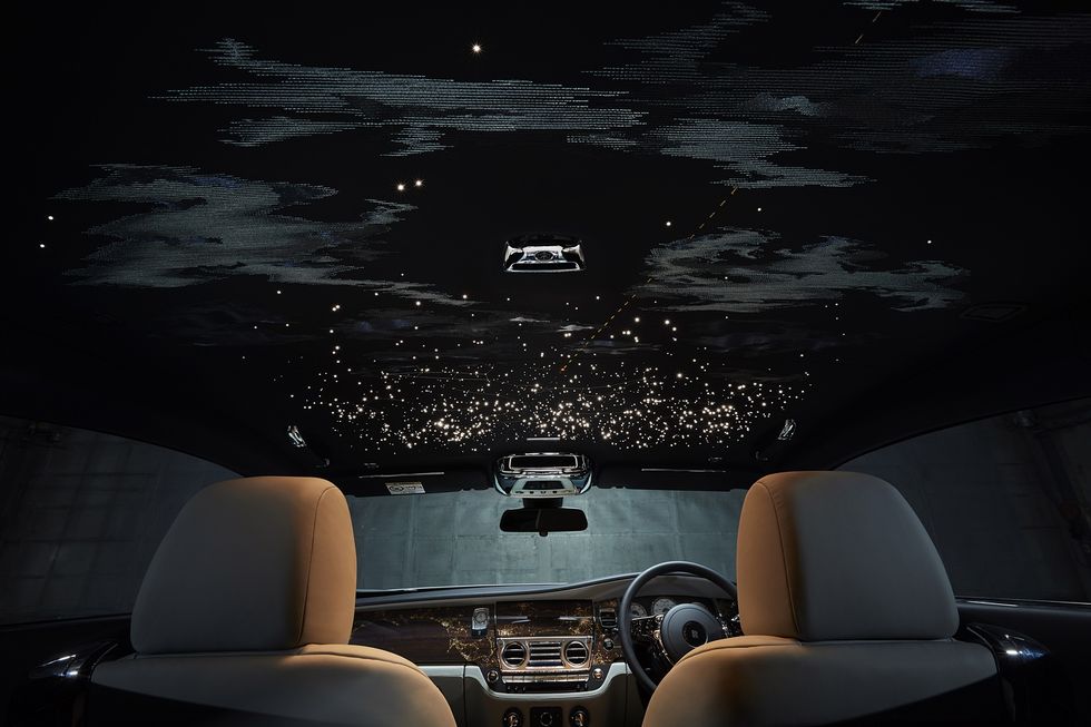 Luxury vehicle, Car, Vehicle, Windshield, Glass, Personal luxury car, Plant, Driving, Window, Automotive window part, 