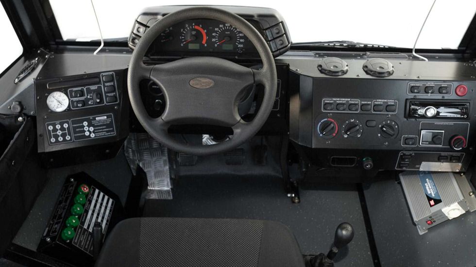 Motor vehicle, Steering wheel, Vehicle, Car, Center console, Steering part, Auto part, Technology, Land rover, Vehicle audio, 