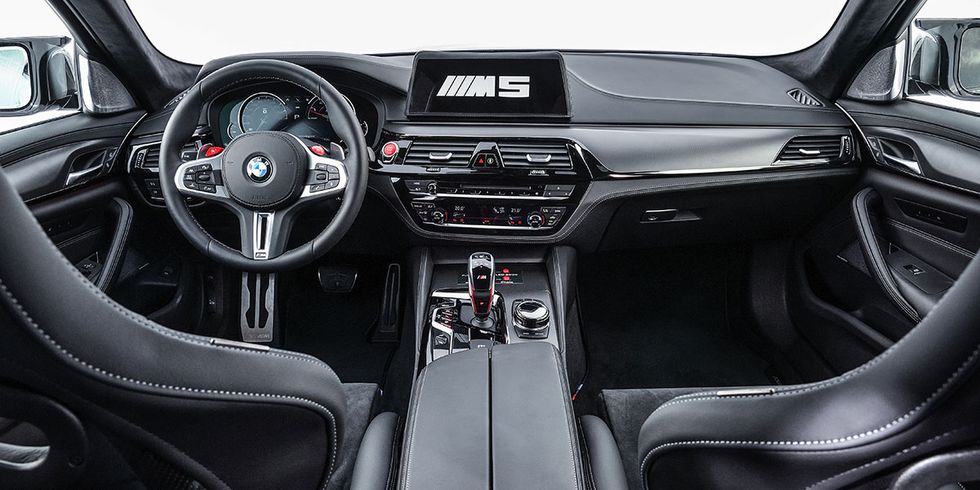 Land vehicle, Vehicle, Car, Personal luxury car, Luxury vehicle, Center console, Steering wheel, Bmw, Executive car, Gear shift, 