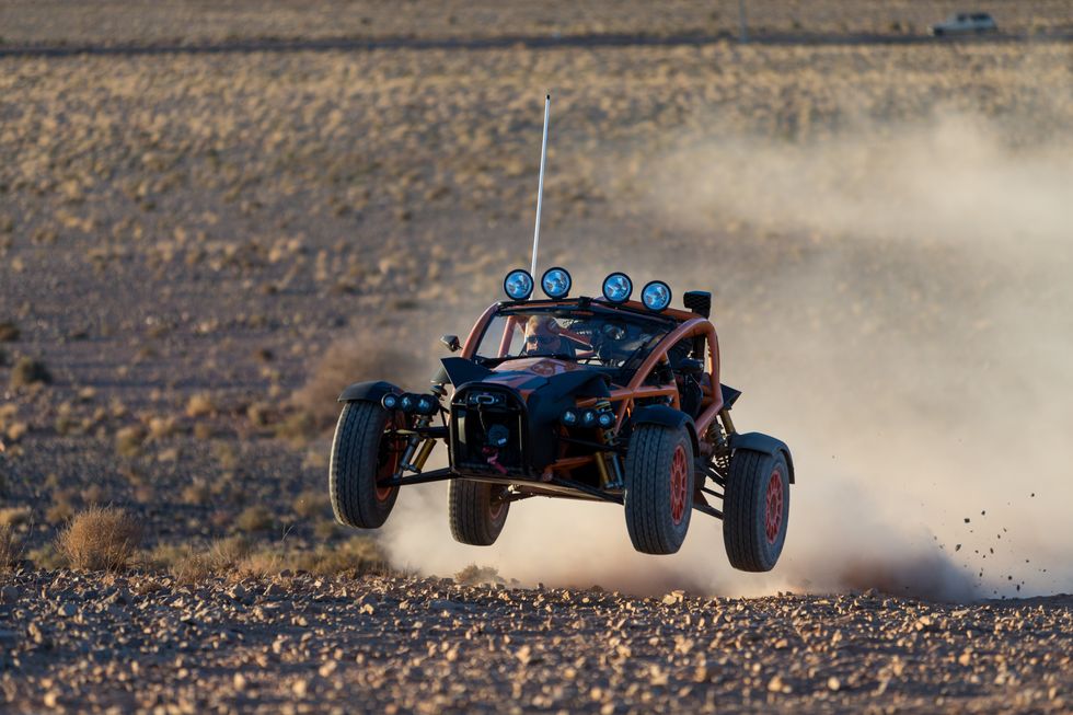 Vehicle, Radio-controlled car, Off-roading, Off-road racing, All-terrain vehicle, Automotive design, Car, Radio-controlled toy, Automotive tire, Off-road vehicle, 