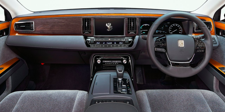 Land vehicle, Vehicle, Car, Luxury vehicle, Steering wheel, Center console, Full-size car, Sedan, 