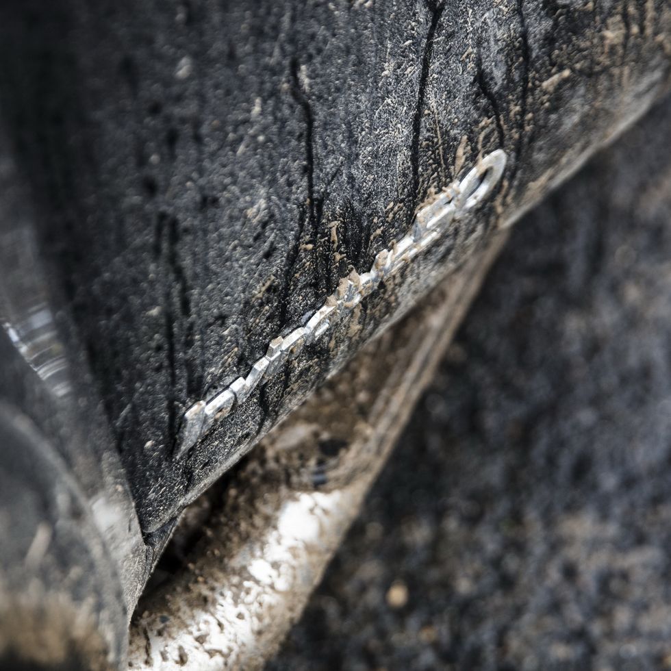 Tire, Automotive tire, Tree, Wood, Close-up, Automotive wheel system, Wheel, Plant, Photography, Trunk, 