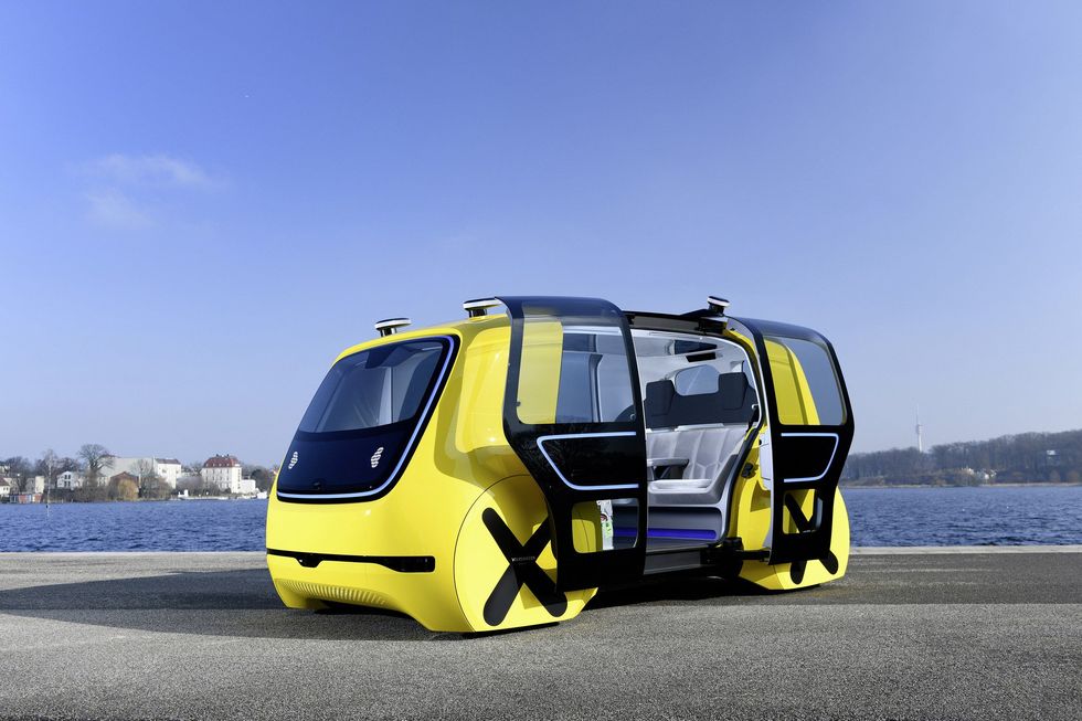 Land vehicle, Vehicle, Motor vehicle, Mode of transport, Transport, Car, Yellow, Commercial vehicle, Automotive design, Compact van, 