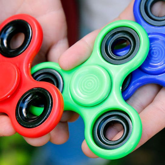 Green, Blue, Bicycle part, Close-up, Material property, Finger, Electric blue, Colorfulness, Circle, Plastic, 