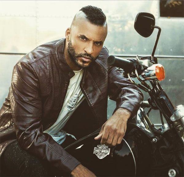 Jacket, Cool, Leather, Leather jacket, Facial hair, Beard, Textile, Music artist, Top, 