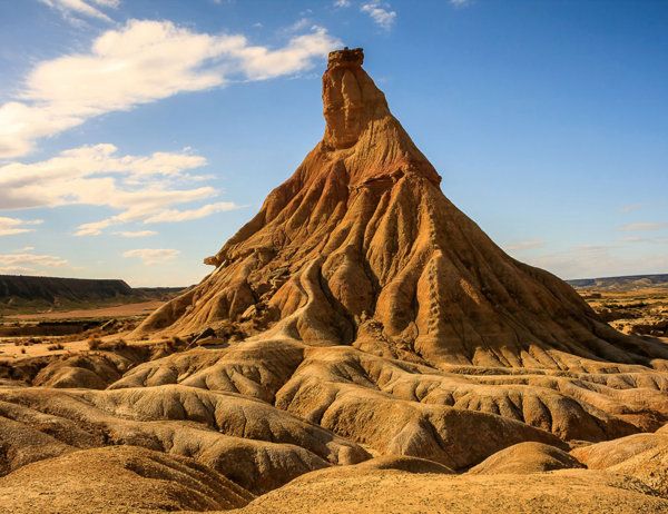 Badlands, Formation, Mountainous landforms, Rock, Butte, Sky, Geology, Landscape, National park, Mountain, 