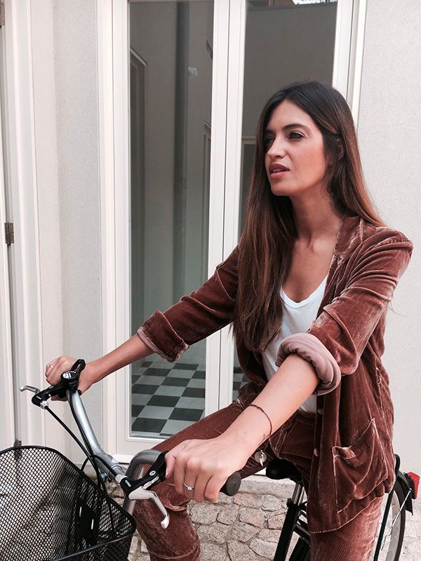Beauty, Bicycle, Outerwear, Fashion, Lip, Vehicle, Photography, Material property, Long hair, Photo shoot, 