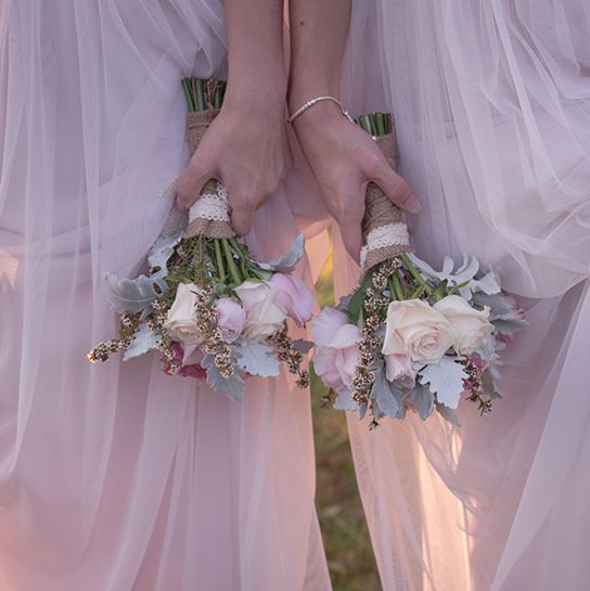Photograph, Wedding dress, Bride, Bridal clothing, Dress, Bouquet, Pink, Gown, Flower, Flower Arranging, 