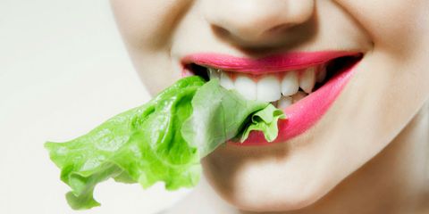 Lip, Mouth, Green, Skin, Tooth, Leaf, Jaw, Ingredient, Leaf vegetable, Eyelash, 