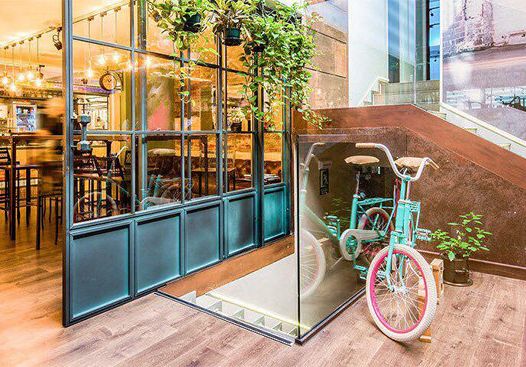 Bicycle wheel, Bicycle, Vehicle, Architecture, Building, Room, Window, Interior design, Bicycle part, Door, 