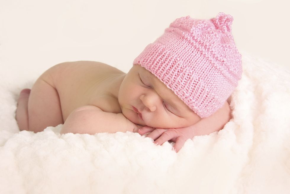 Child, Baby, Pink, Photograph, Beanie, Skin, Headgear, Baby sleeping, Toddler, Knit cap, 