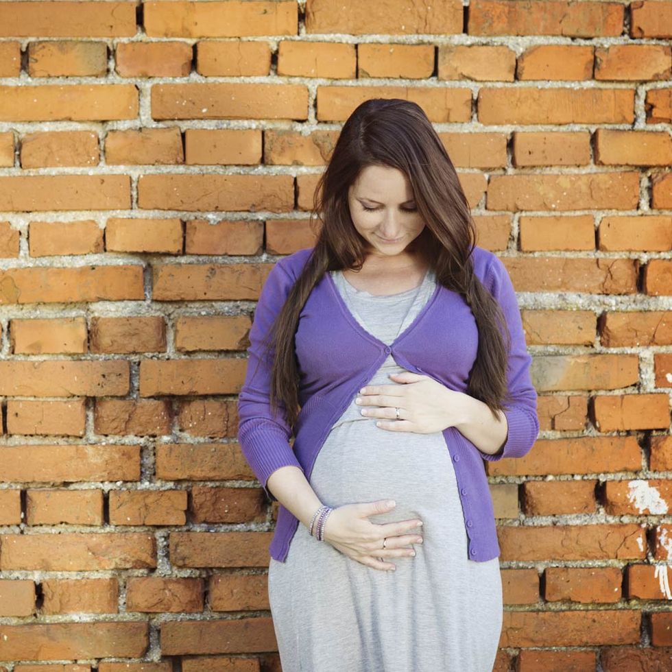 Purple, Blue, Brick, Clothing, Wall, Pink, Fashion, Outerwear, Photo shoot, Shoulder, 