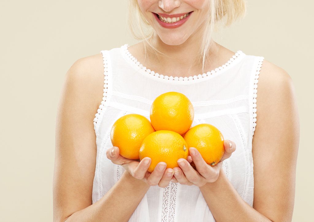Yellow, Balloon, Blond, Fruit, Party supply, Smile, Plant, Muscle, Food, Hand, 
