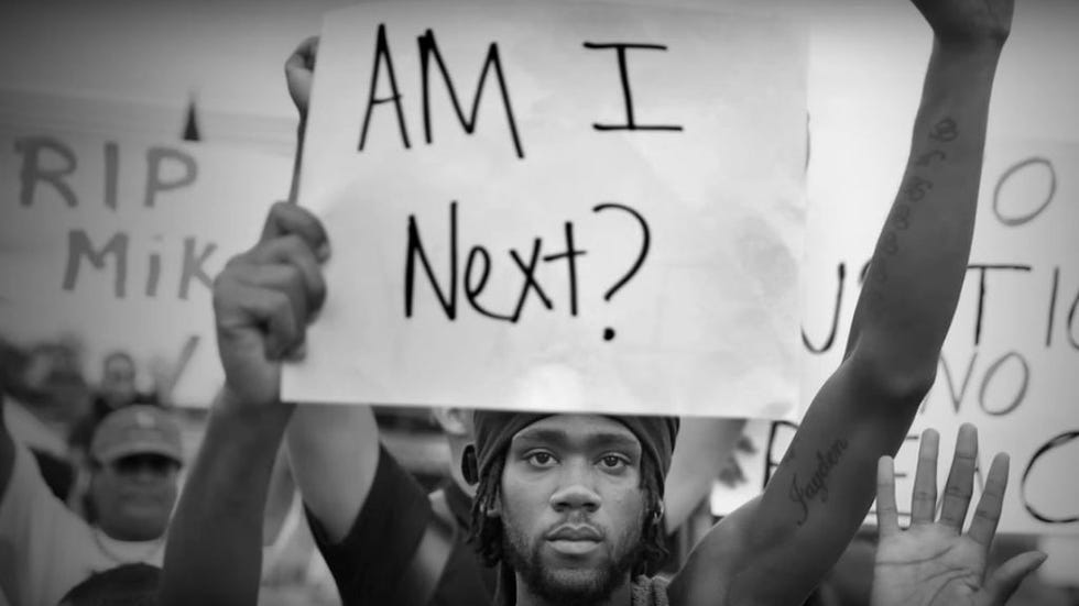 Photograph, People, Text, Black-and-white, Font, Protest, Forehead, Human, Photography, Monochrome, 