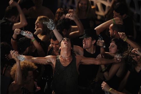 Arm, People, Social group, Hand, Celebrating, Crowd, Audience, Cheering, Sleeveless shirt, Vest, 