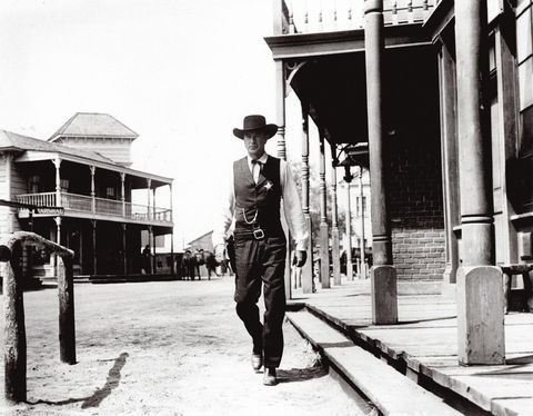 Standing, Monochrome, Hat, Monochrome photography, Black-and-white, Sun hat, Vintage clothing, Fedora, Column, Stock photography, 