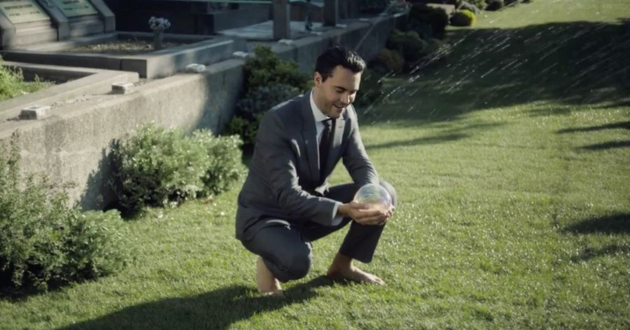 Grass, Sitting, Suit, Formal wear, People in nature, Blazer, Suit trousers, Knee, Grass family, Barefoot, 