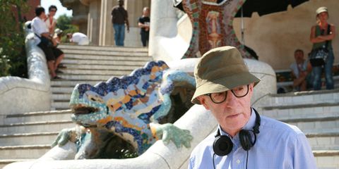 Eyewear, Human, Vision care, Hat, Sculpture, Temple, Stairs, Sun hat, Fedora, Water feature, 