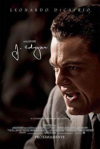 Forehead, Poster, Photography, Movie, Photo caption, Tie, Pleased, Biography, Tongue, Portrait photography, 