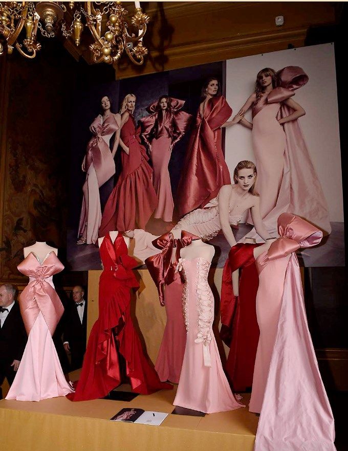 Pink, Gown, Light fixture, Fashion, Dress, Interior design, Chandelier, Stage, Costume design, Costume, 