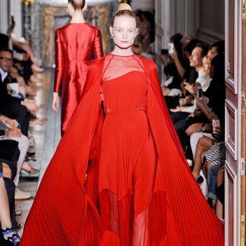 Dress, Outerwear, Red, Fashion show, Style, Fashion model, Gown, Runway, Fashion, Costume design, 