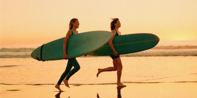 Human, Surfing Equipment, Surfboard, Fun, Standing, People in nature, Surface water sports, Vacation, Boardsport, Beach, 